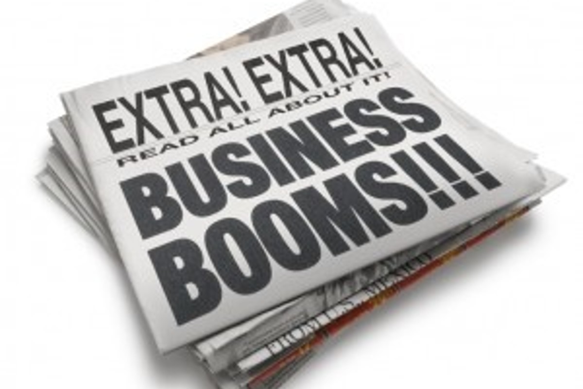 Newspaper clipping that says "Business Booms"